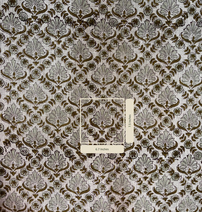 Textile with a detailed pattern and a label on a matching background