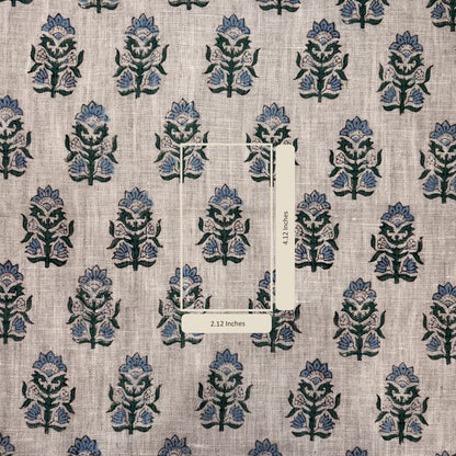 Textile with floral pattern and measurement labels on a beige background