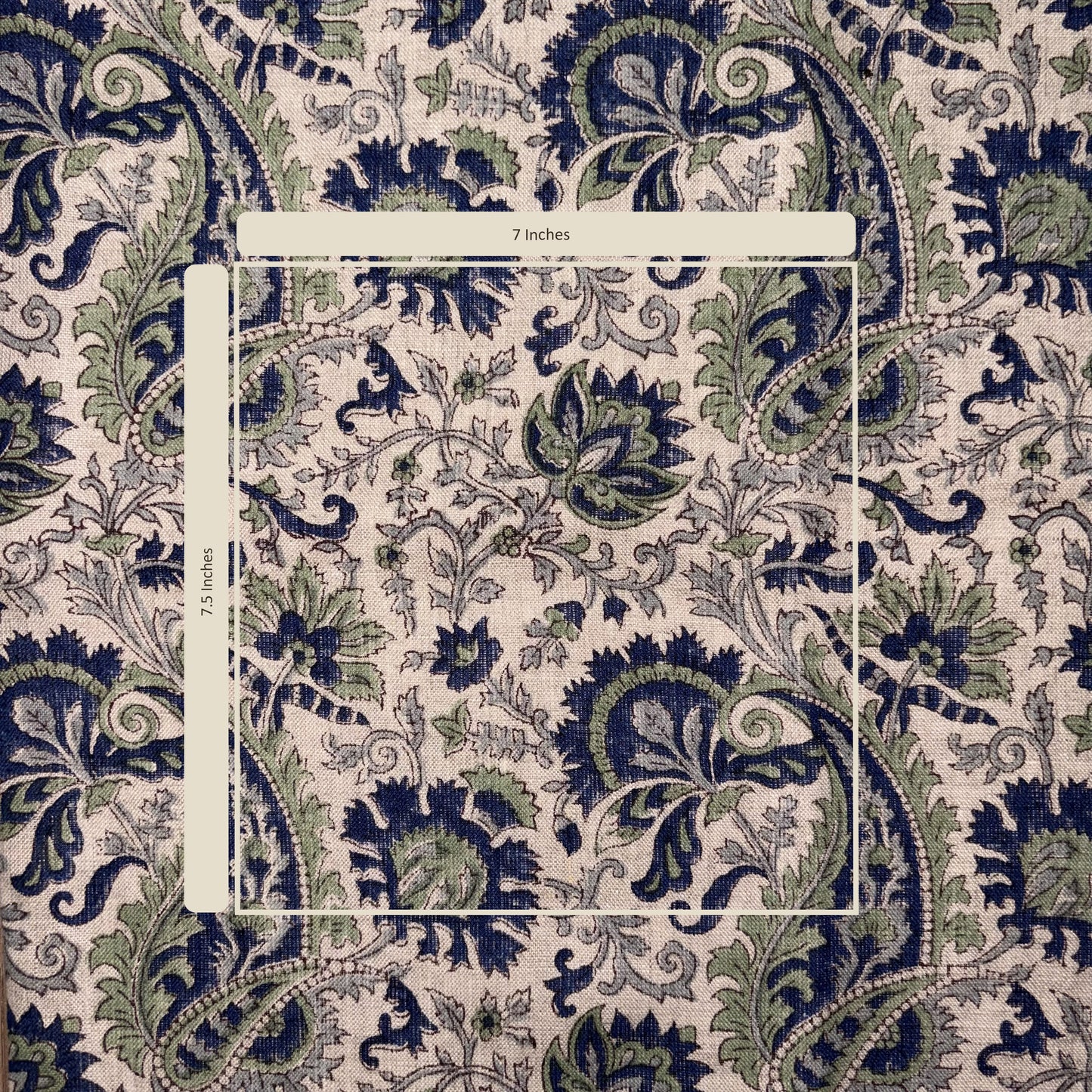 Close-up of a floral patterned fabric with a measurement label.