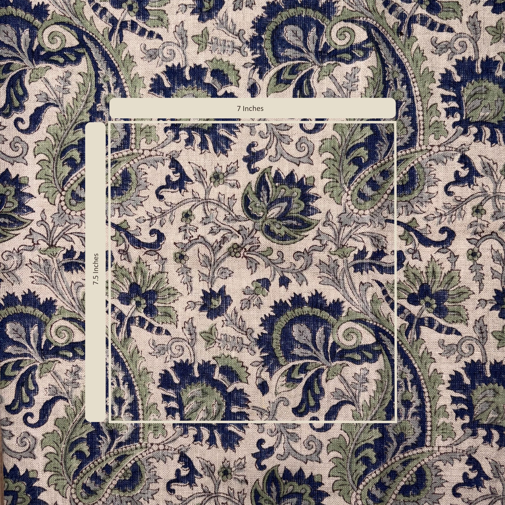 Close-up of a floral patterned fabric with a measurement label.