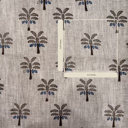 Fabric with palm tree pattern and measurement labels on a gray background