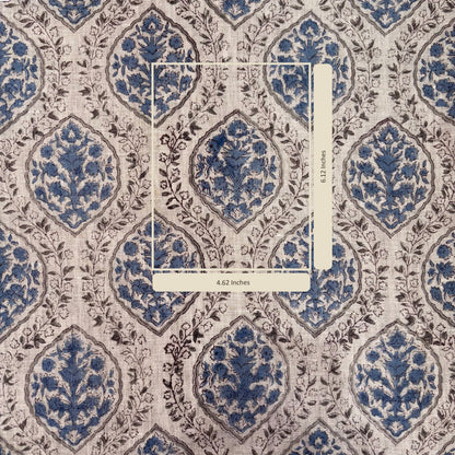 Patterned fabric with blue and grey design, featuring a ruler for scale.