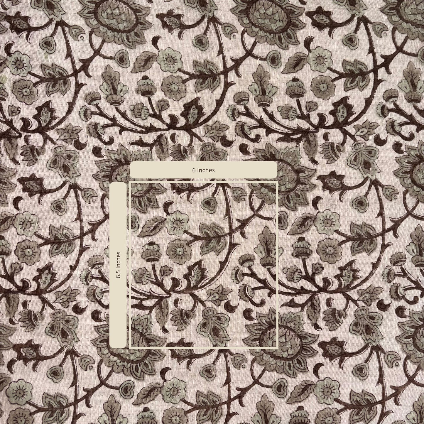 Floral patterned fabric with a measurement label indicating 6 inches.