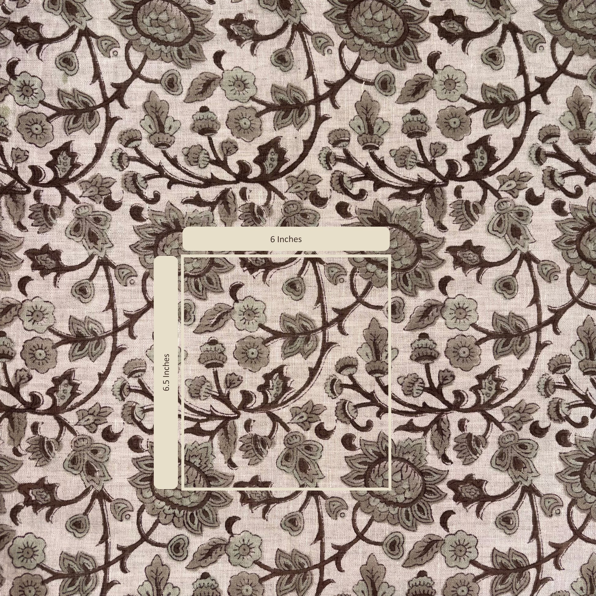 Floral patterned fabric with a measurement label indicating 6 inches.