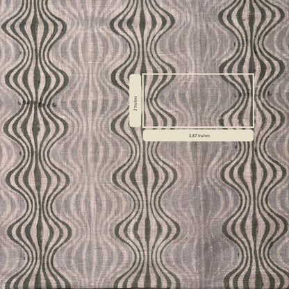 Textile with wavy pattern and measurement label