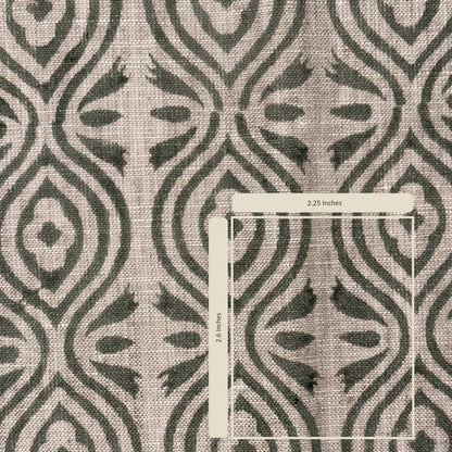 Textile with a geometric pattern and a ruler for scale