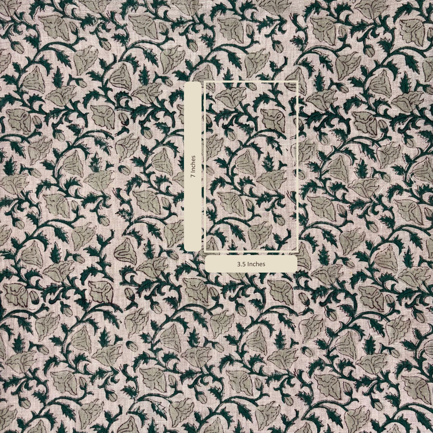 Patterned fabric with a rectangular measurement label in the center.