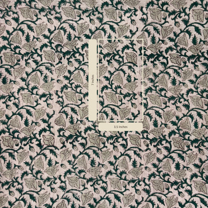 Patterned fabric with a rectangular measurement label in the center.