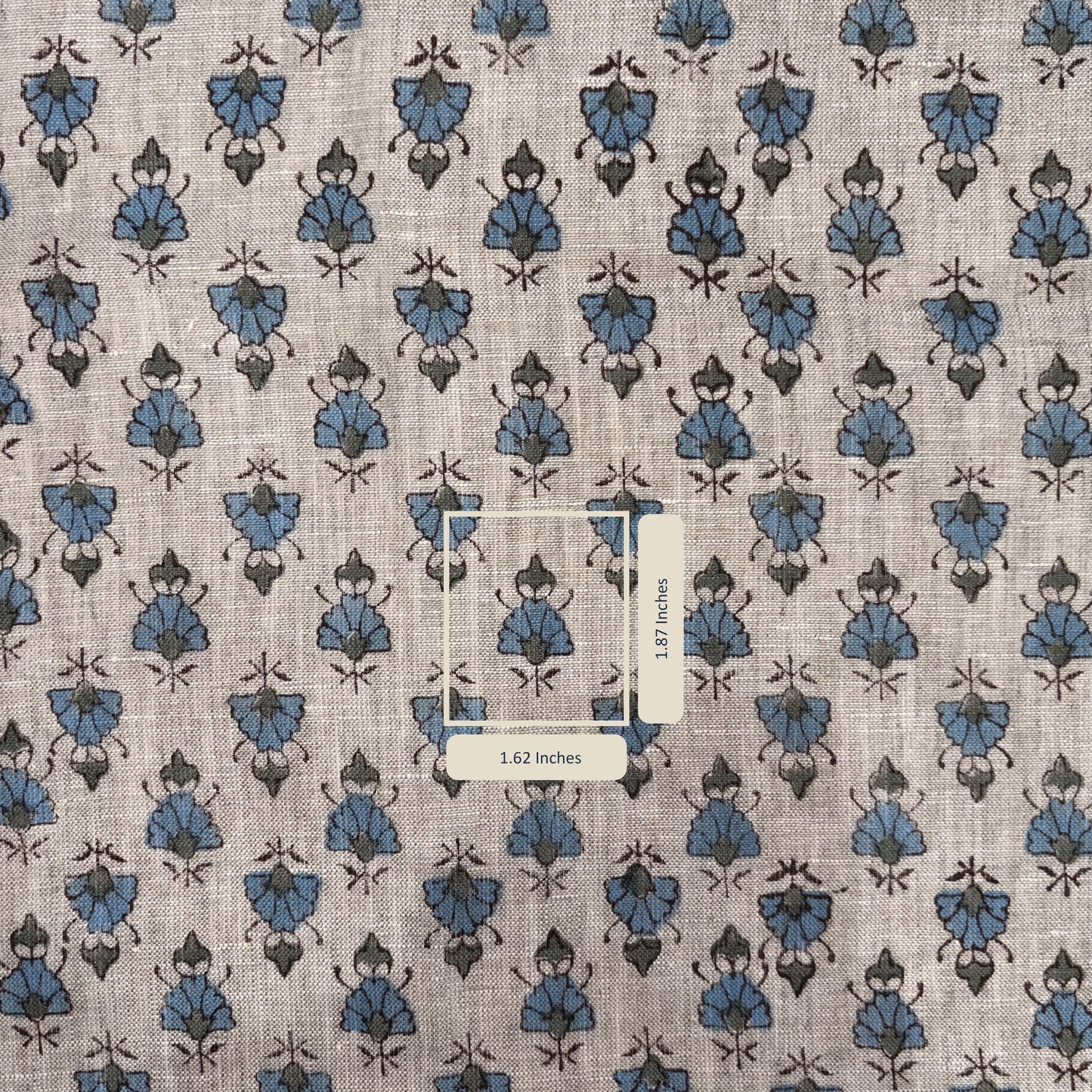 Patterned fabric with blue and brown designs on a grey background