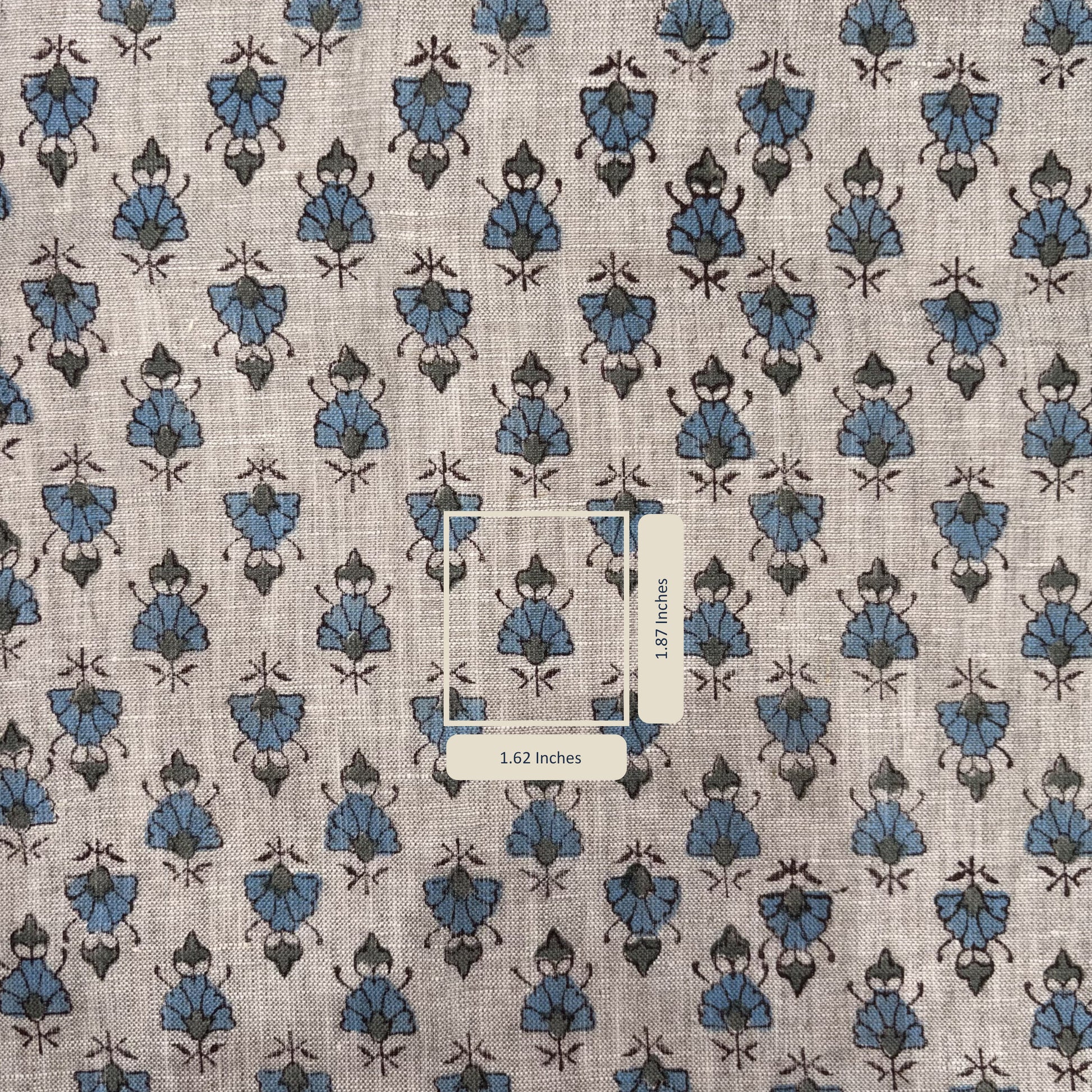 Patterned fabric with blue and brown designs on a grey background
