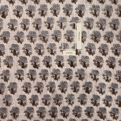 Fabric with a floral pattern and showing measurements.