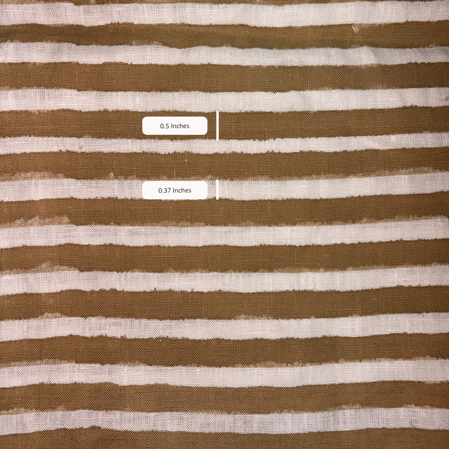 Brown and white striped fabric with measurements overlaid