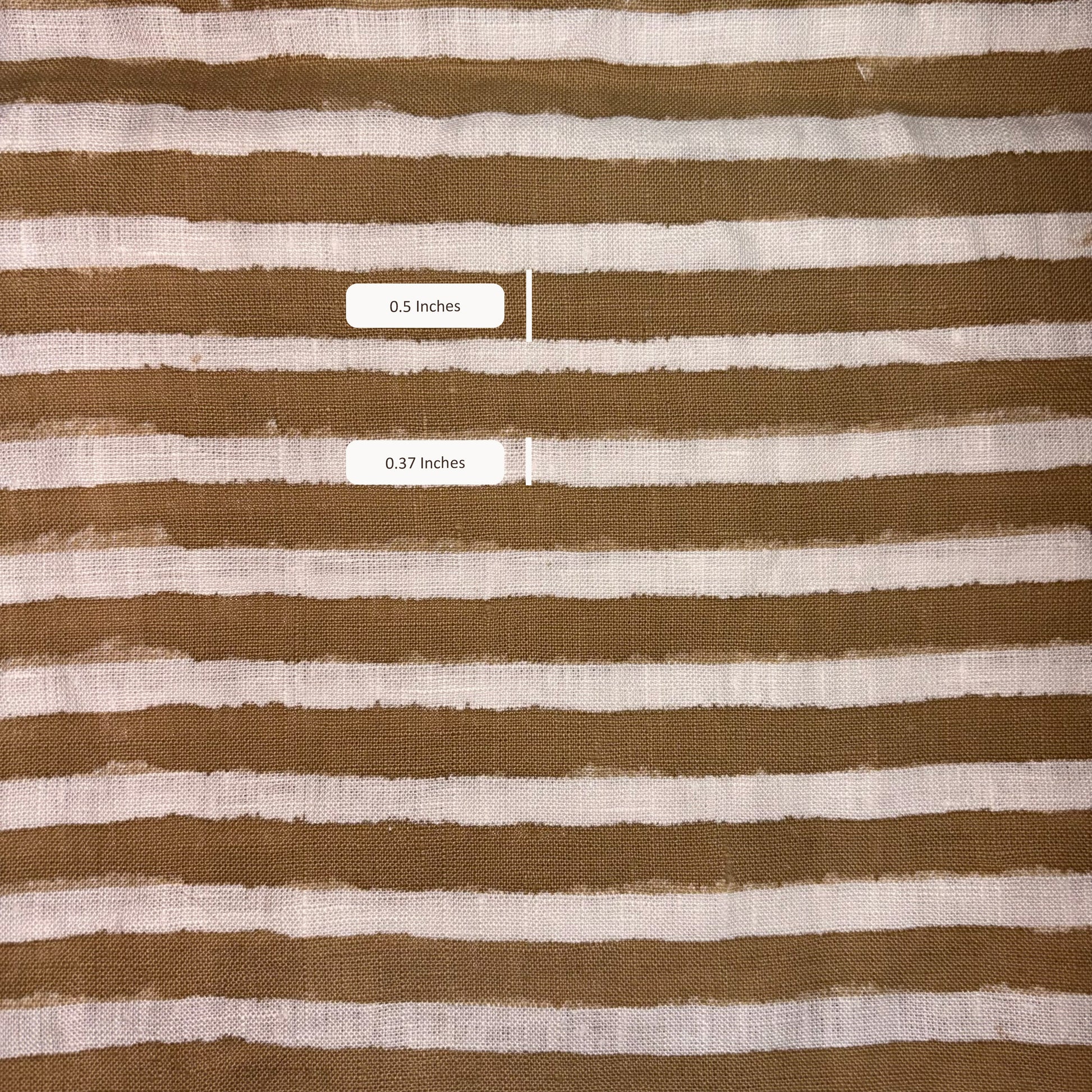 Brown and white striped fabric with measurements overlaid