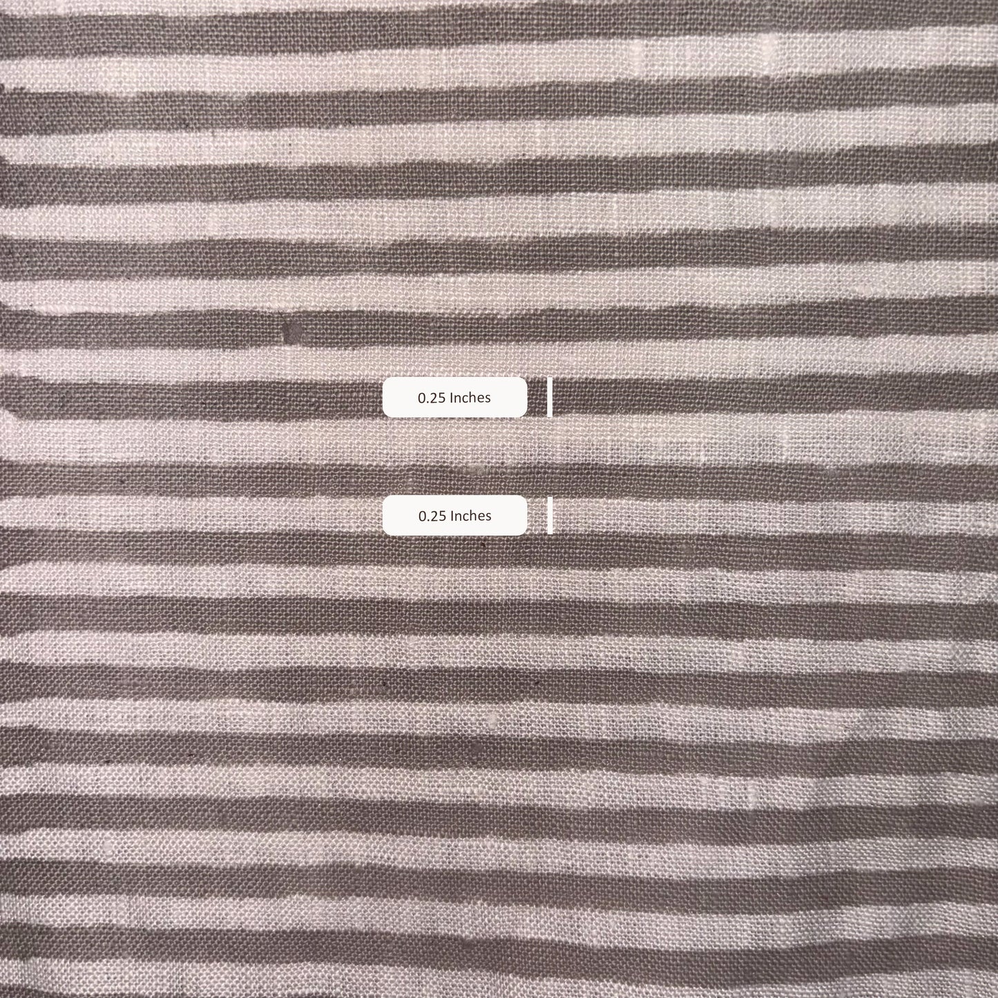 Striped fabric with measurement labels showing width of stripes