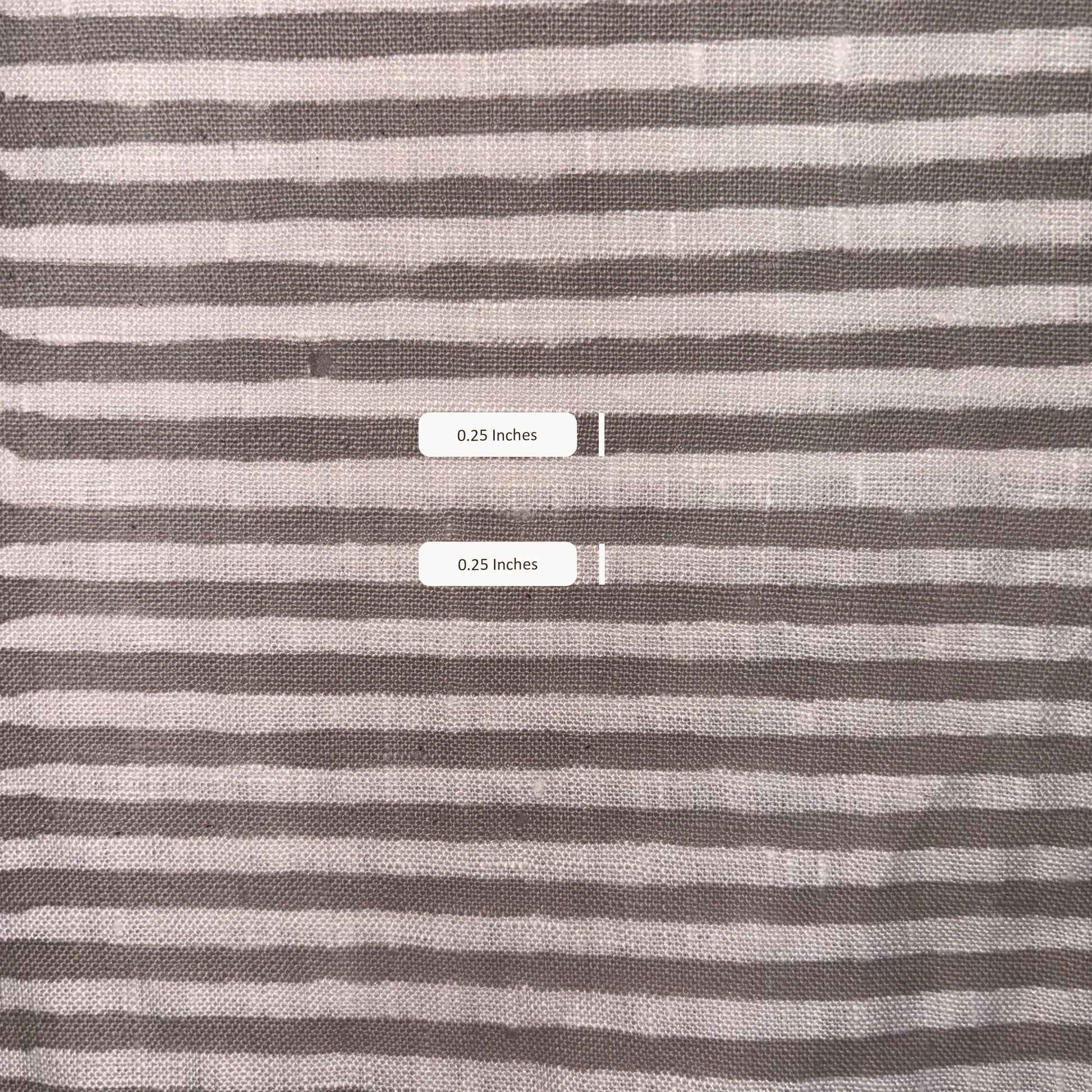 Striped fabric with measurement labels showing width of stripes