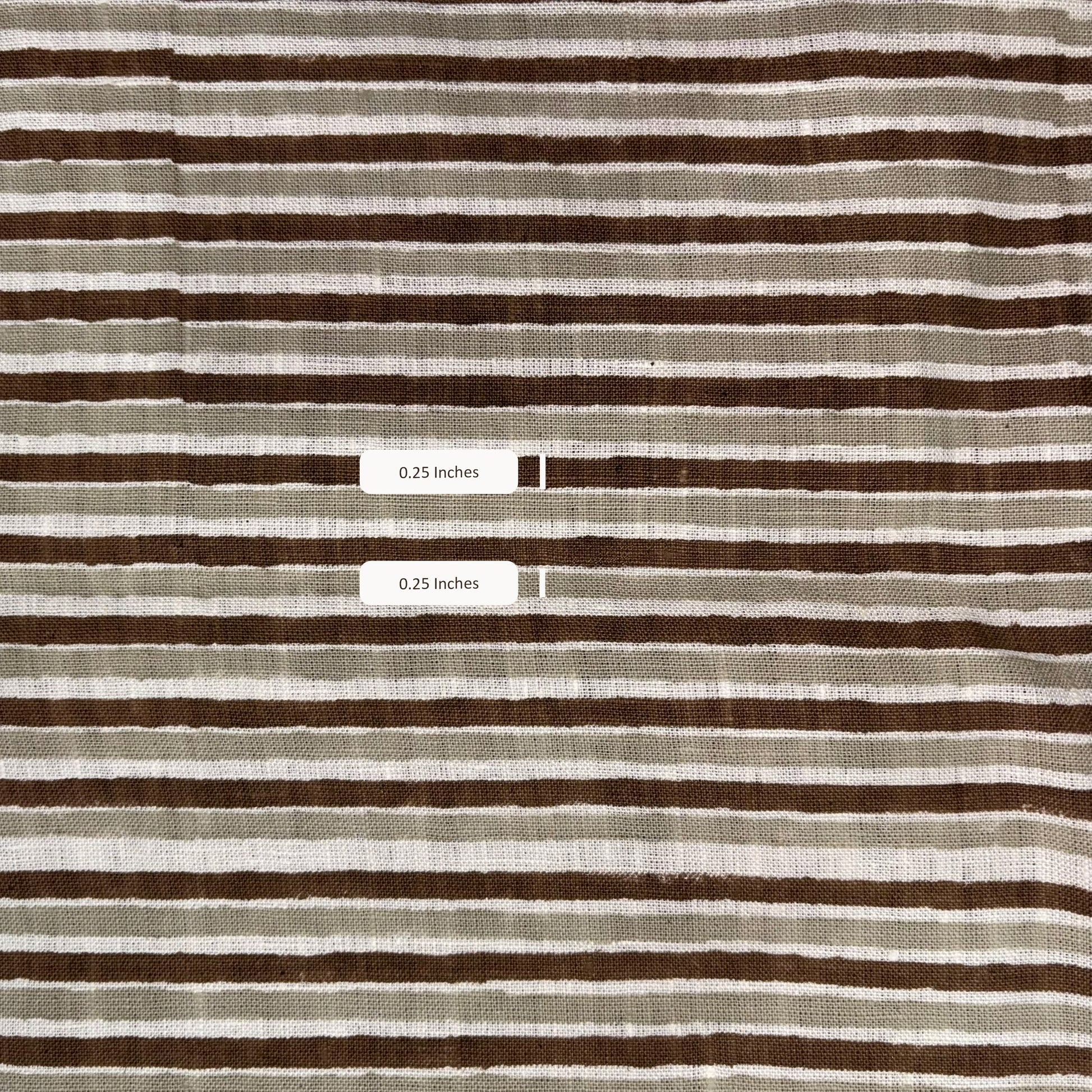 Striped fabric with brown and beige stripes and a measurement label.