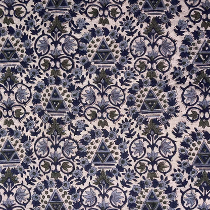 Patterned fabric with blue and green design on a grey background