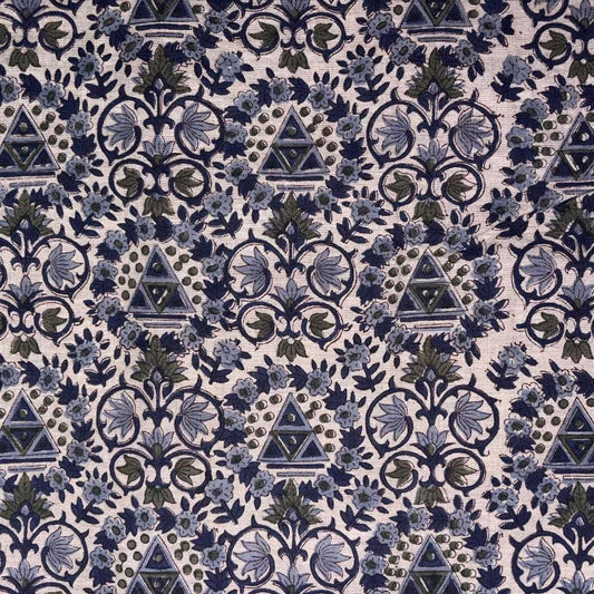 Patterned fabric with blue and green design on a grey background