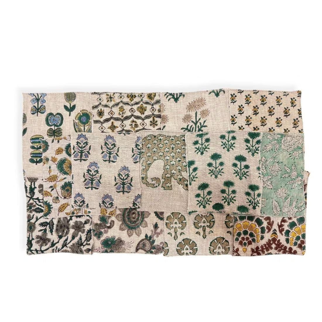 Fabric swatches featuring a collage of vintage-style botanical and floral patterns in muted green, blue, orange, and brown on a cream background.